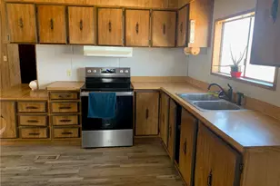 7587 W Unkar Dr, Golden Valley, AZ 86413 - Photo 9