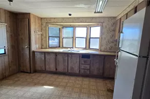 4842 N Gln Cyn Rd, Golden Valley, AZ 86413 - Photo 9