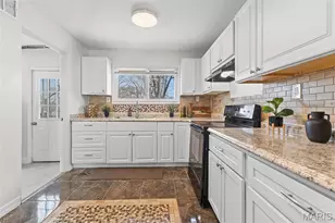 6813 St Olaf Dr, Berkeley, MO 63134 - Photo 9