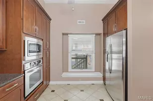 7312 Woodlawn Colonial Ln, Shrewsbury, MO 63119 - Photo 7