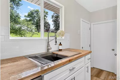 8630 North Avenue, Saint John, MO 63114 - Photo 11
