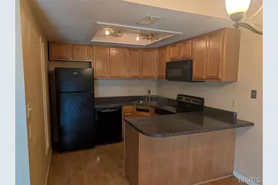 1380 Heritage Landing #106, Saint Charles, MO 63303 - Photo 3