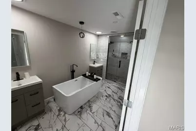 10643 Thorpe Avenue, Saint Louis, MO 63114 - Photo 19