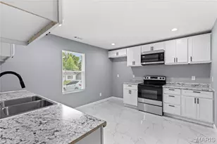 9825 Dennis Dr, Saint Louis, MO 63136 - Photo 5
