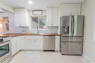 6310 Heintz Rd, Oakville, MO 63129 - Photo 13
