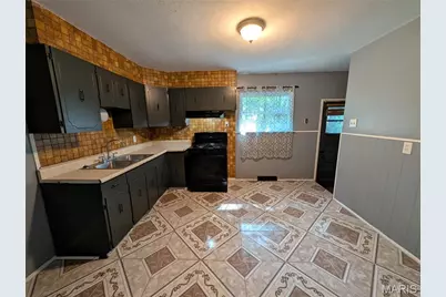 10504 Baron Drive, Castle Point, MO 63136 - Photo 3