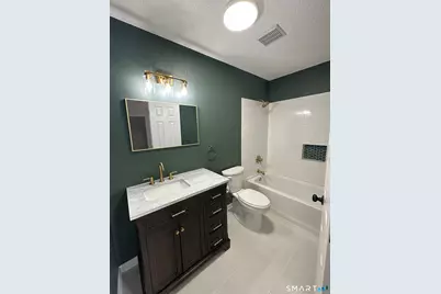 318 Carriage Crossing Lane #318, Middletown, CT 06457 - Photo 11