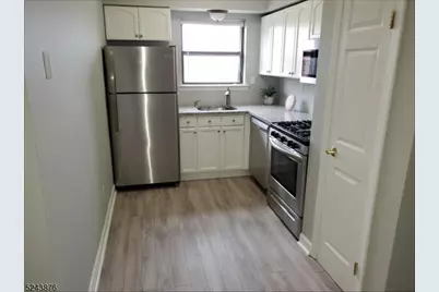 602 Nottingham Way, Raritan Township, NJ 08822 - Photo 1