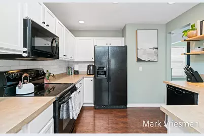 7938 Brewer Woods Court SE, Byron Center, MI 49315 - Photo 13