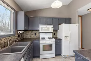 831 Scott Woods Dr NE, Comstock Park, MI 49321 - Photo 9