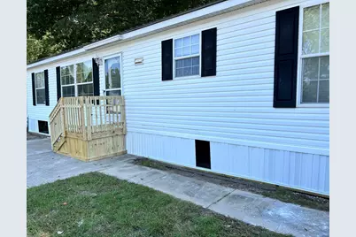 668 Hansel Street NW, Comstock Park, MI 49321 - Photo 1