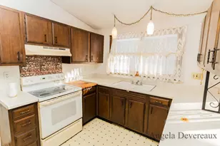 6040 N Hillman Rd, Six Lakes, MI 48886 - Photo 9