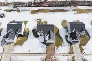 154 Sweet Meadow Dr NW, Kent City, MI 49330 - Photo 27