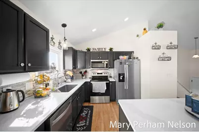 154 Sweet Meadow Drive NW, Kent City, MI 49330 - Photo 5