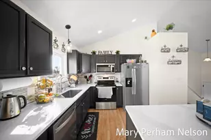 154 Sweet Meadow Dr NW, Kent City, MI 49330 - Photo 5