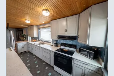 4409 W 1 Mile Road, White Cloud, MI 49349 - Photo 13