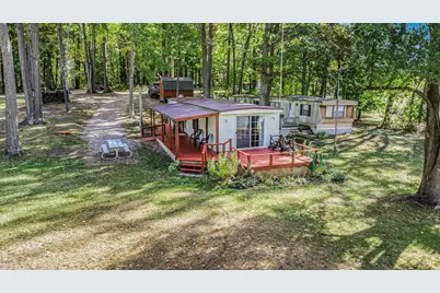 4499 Woodland Drive, Six Lakes, MI 48886 - Photo 1