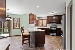 3140 Riverwoods Dr NE, Rockford, MI 49341 - Photo 17