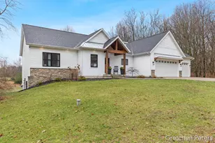 7540 Thornapple Dales Dr SE, Alto, MI 49302 - Photo 1