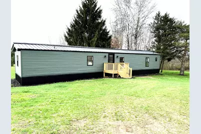 1595 N County Line Road, Six Lakes, MI 48886 - Photo 1