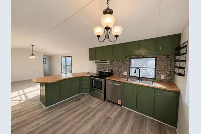 1281 E Pontaluna Road #138, Norton Shores, MI 49456 - Photo 3