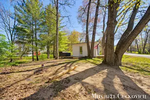 12567 McMurty Dr NE, Sand Lake, MI 49343 - Photo 17