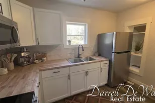 8425 N Holland Rd, Six Lakes, MI 48886 - Photo 3