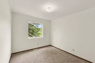 3880 Whispering Oaks Dr, Traverse City, MI 49696 - Photo 19