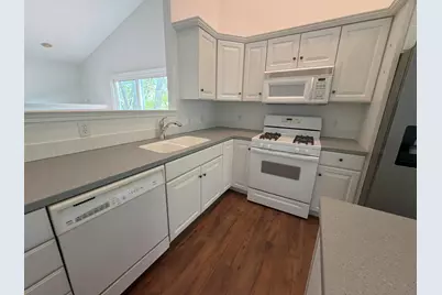 1440 Woodlawn Cmns #10, Grand Haven, MI 49417 - Photo 27