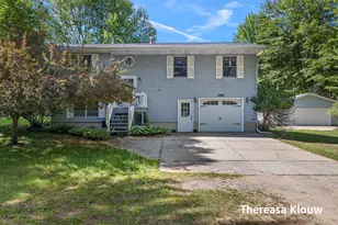 6969 E Pontaluna Rd, Fruitport, MI 49415 - Photo 1