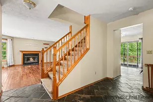 12080 Pine Cone Dr NE, Rockford, MI 49341 - Photo 3