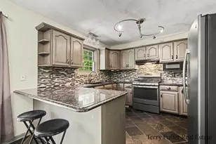 12080 Pine Cone Dr NE, Rockford, MI 49341 - Photo 7