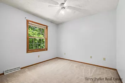 12080 Pine Cone Drive NE, Rockford, MI 49341 - Photo 17