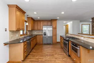 8303 Cowan Lake Dr NE, Rockford, MI 49341 - Photo 11