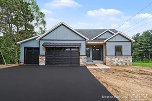 186 9 Mile Rd NE, Comstock Park, MI 49321 - Photo 1