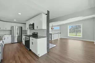 6335 Pine Island Dr NE, Comstock Park, MI 49321 - Photo 9