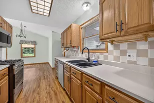 9265 Golf Port Dr, Canadian Lakes, MI 49346 - Photo 11