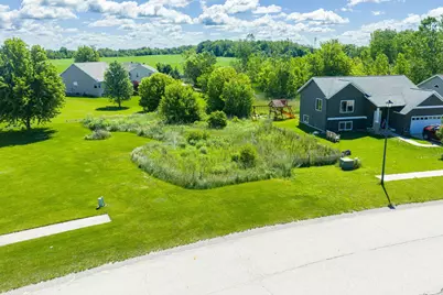 228 Chary Ridge Drive NW, Kent City, MI 49330 - Photo 3