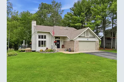 9551 Clubhouse Drive W, Canadian Lakes, MI 49346 - Photo 1