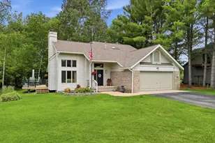 9551 Clubhouse Dr W, Canadian Lakes, MI 49346 - Photo 1