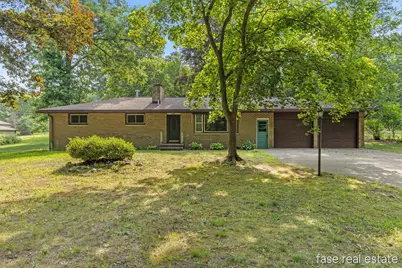 7676 Courtland Drive NE, Rockford, MI 49341 - Photo 1