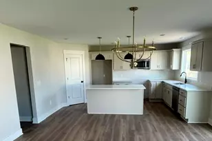 671 Waterford Village Dr NW, Grand Rapids, MI 49534 - Photo 3