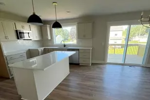 671 Waterford Village Dr NW, Grand Rapids, MI 49534 - Photo 5