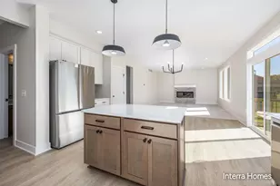7882 Woodhurst Dr NE, Rockford, MI 49341 - Photo 13