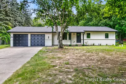 11648 Woodgate Drive NW, Grand Rapids, MI 49534 - Photo 1