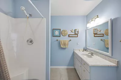 1416 Woodlawn Cmns, Grand Haven, MI 49417 - Photo 13
