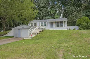 357 Mabel St NW, Comstock Park, MI 49321 - Photo 1