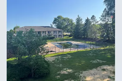 6103 Orchard Lake Road #203, West Bloomfield, MI 48322 - Photo 1