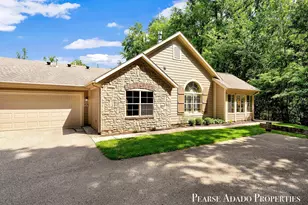 1033 Bridge Crest Dr SE, Ada, MI 49301 - Photo 1