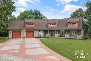 590 Talisman Dr NE, Lowell, MI 49331 - Photo 1